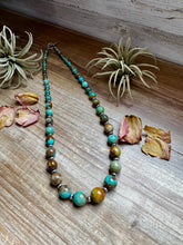 Load image into Gallery viewer, 24-Inch Graduated Turquoise Necklace with Sterling Silver Saucers – One-of-a-Kind
