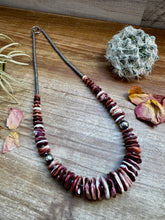 Load image into Gallery viewer, 22 Inch graduated necklace more purple and orange spiny and sterling silver pearls
