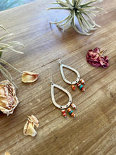 Load image into Gallery viewer, Orange spiny dangle earrings with turquoise
