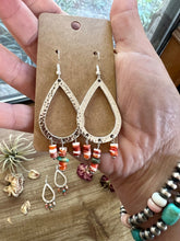 Load image into Gallery viewer, Orange spiny dangle earrings with turquoise
